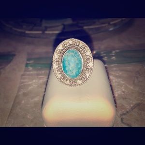 Sterling silver ring with blue stone